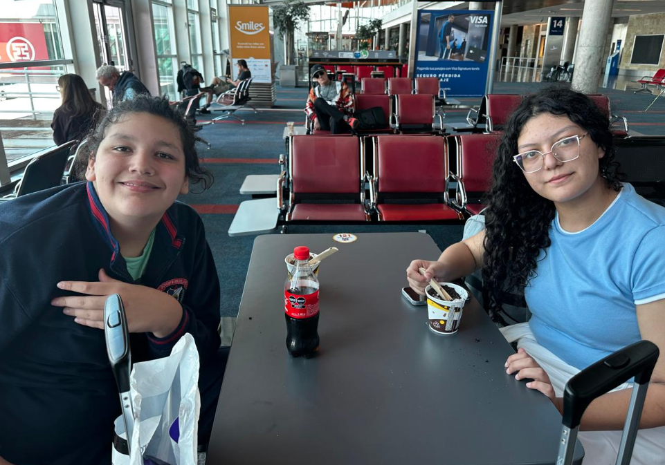 Students in airport waiting area